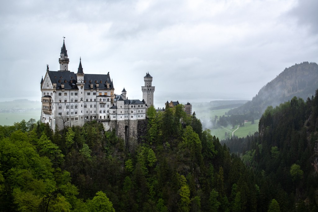 Rainy day at the famous tourist attraction in the Bavarian Alps, Neuschwanstein, a fairytale castle